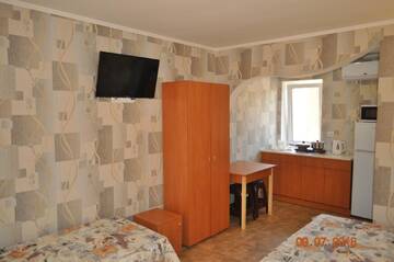 Фото номера Роскошный четырехместный номер Курортные отели Orfey Resort г. Кирилловка 9