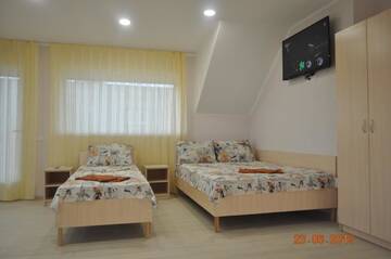 Фото номера Улучшенный люкс Курортные отели Orfey Resort г. Кирилловка 9