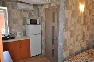 Фото номера Роскошный четырехместный номер Курортные отели Orfey Resort г. Кирилловка 7
