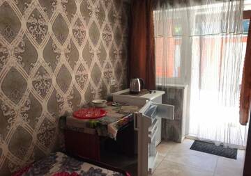 Фото номера Двухместный номер с 2 отдельными кроватями Гостевой дом Гостевой дом Авина г. Кирилловка 4