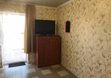 Фото номера Трехместный номер Гостевой дом Гостевой дом Авина г. Кирилловка 5