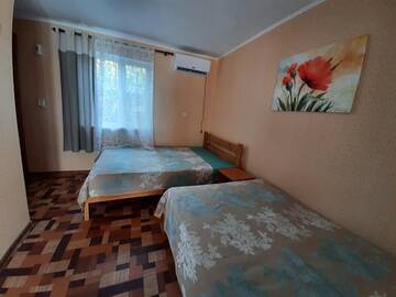 Фото номера Четырехместный номер Делюкс Гостевой дом GhestHouse charivna9 г. Кирилловка 3