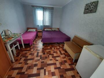 Фото номера Стандартный трехместный номер Гостевой дом GhestHouse charivna9 г. Кирилловка 3
